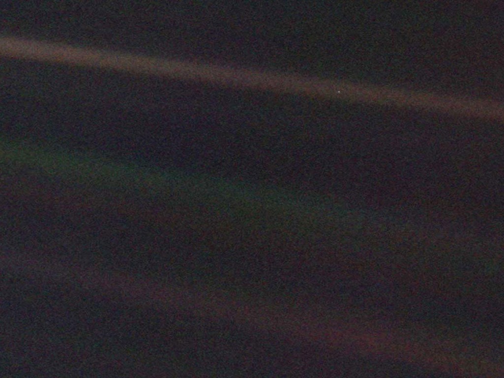 El Punto Azul Pálido que la Voyager 1 fotografió en 1990. Le llamamos La Tierra