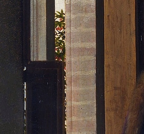Detalle de las cerezas tras la ventana.