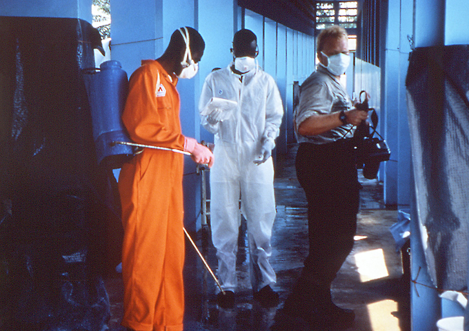 This 1995 photograph shows sanitary procedures being practiced in a clinic in Zaire during Ebola virus disease outbreak.