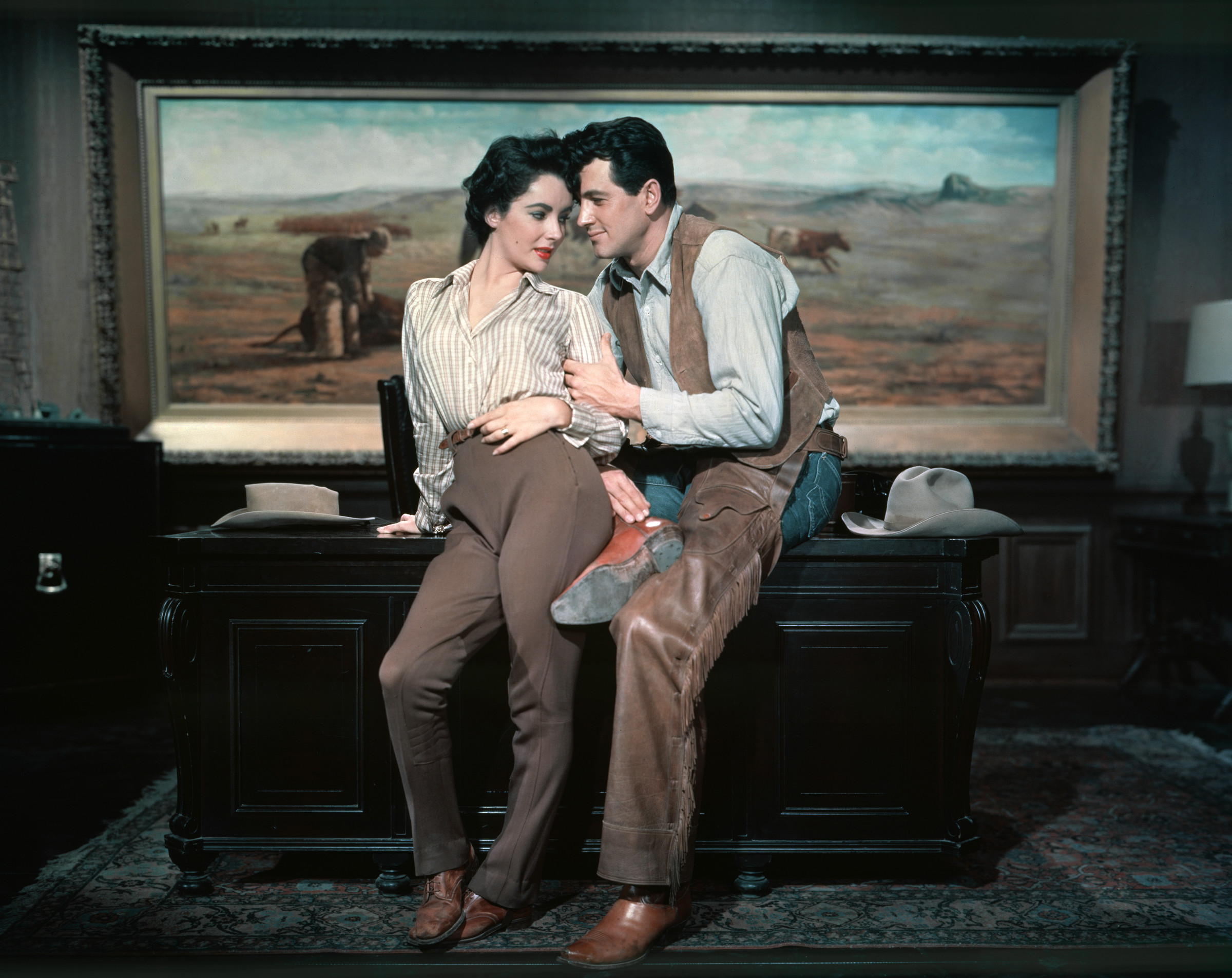 1957 --- Elizabeth Taylor and Rock Hudson on the set of "Giant". --- Image by © Sunset Boulevard/Corbis