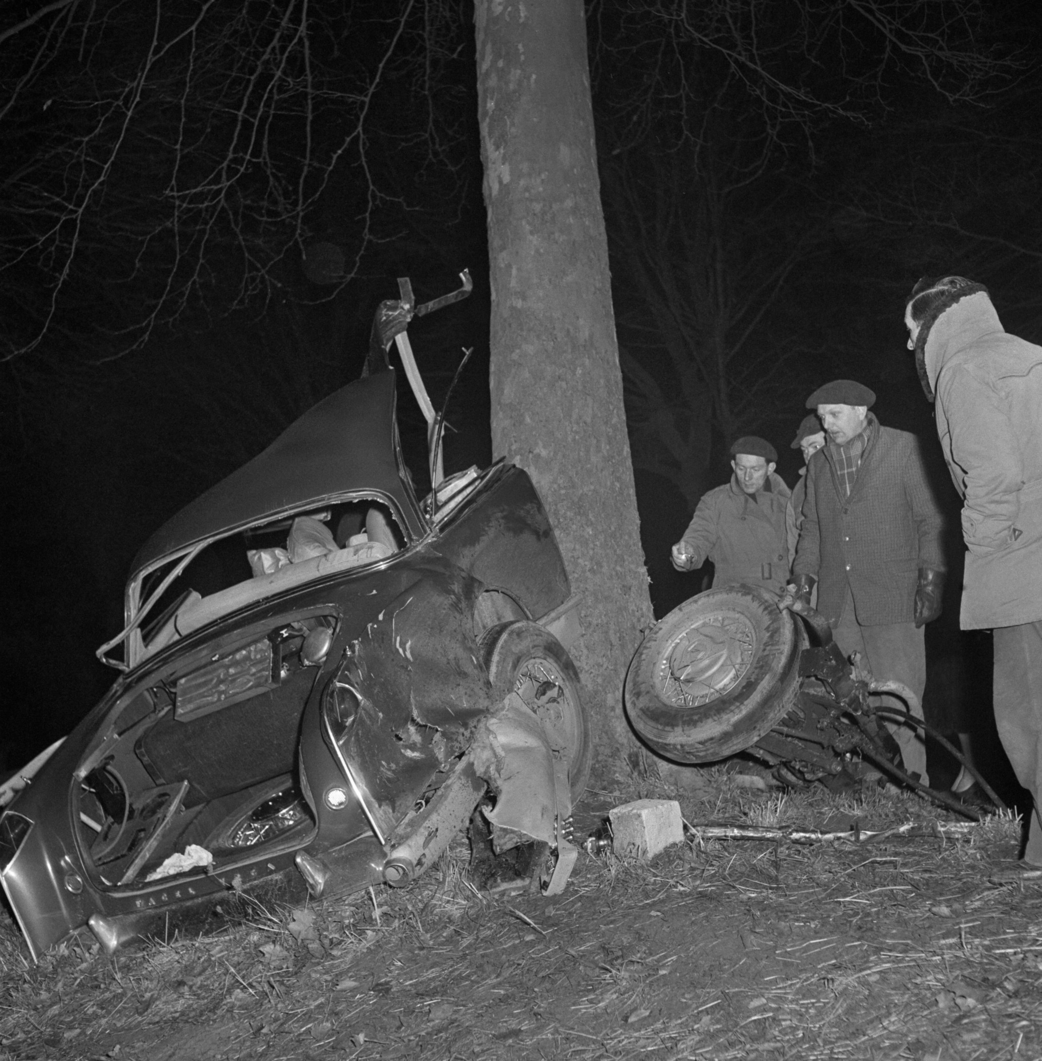 06 Jan 1960 --- Rescuers take a last look at the shattered wreck of the powerful, custom built Facel Vega auto in which famed French author Albert Camus met death near here, east of Paris. The car careened into a tree at about 80 miles an hour after tire blew out. Riding with the Nobel Literature prize winner (1957) were well-known publisher Michel Gallimard and Madame Gallimard. --- Image by © Bettmann/Corbis