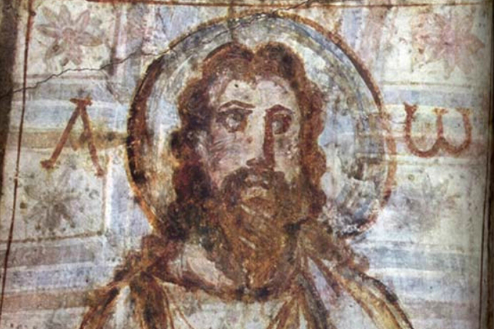 Jesús con barba y cabello largo, en unas catacumbas. Siglos IV-V.
