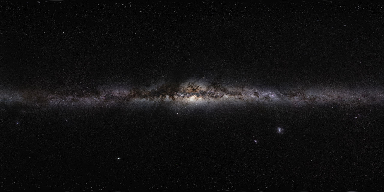 This magnificent 360-degree panoramic image, covering the entire southern and northern celestial sphere, reveals the cosmic landscape that surrounds our tiny blue planet. This gorgeous starscape serves as the first of three extremely high-resolution images featured in the GigaGalaxy Zoom project, launched by ESO within the framework of the International Year of Astronomy 2009 (IYA2009). The plane of our Milky Way Galaxy, which we see edge-on from our perspective on Earth, cuts a luminous swath across the image. The projection used in GigaGalaxy Zoom place the viewer in front of our Galaxy with the Galactic Plane running horizontally through the image — almost as if we were looking at the Milky Way from the outside. From this vantage point, the general components of our spiral galaxy come clearly into view, including its disc, marbled with both dark and glowing nebulae, which harbours bright, young stars, as well as the Galaxy’s central bulge and its satellite galaxies. As filming extended over several months, objects from the Solar System came and went through the star fields, with bright planets such as Venus and Jupiter. For copyright reasons, we cannot provide here the full 800-million-pixel original image, which can be requested from Serge Brunier. The high resolution image provided here contains 18 million pixels.