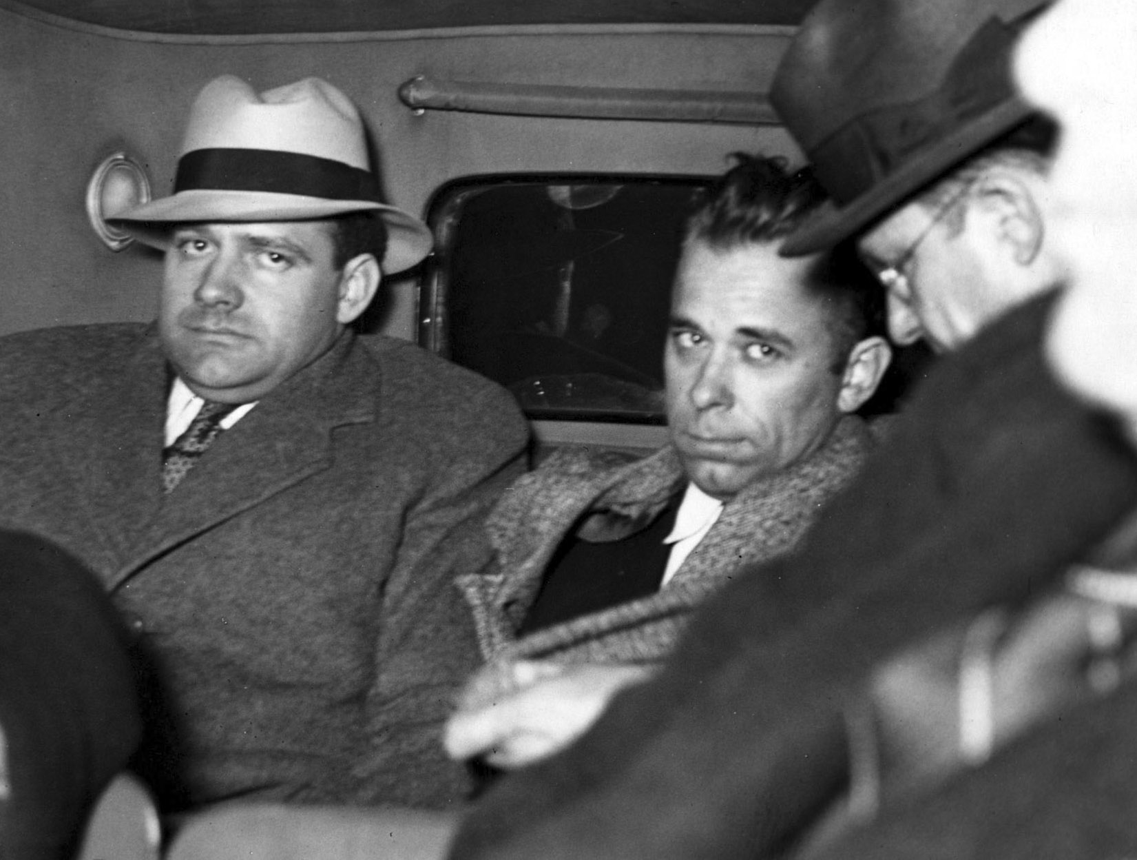 JOHN DILLINGER-Dillinger under heavy guard as he is driven to Indiana. 1-30-34