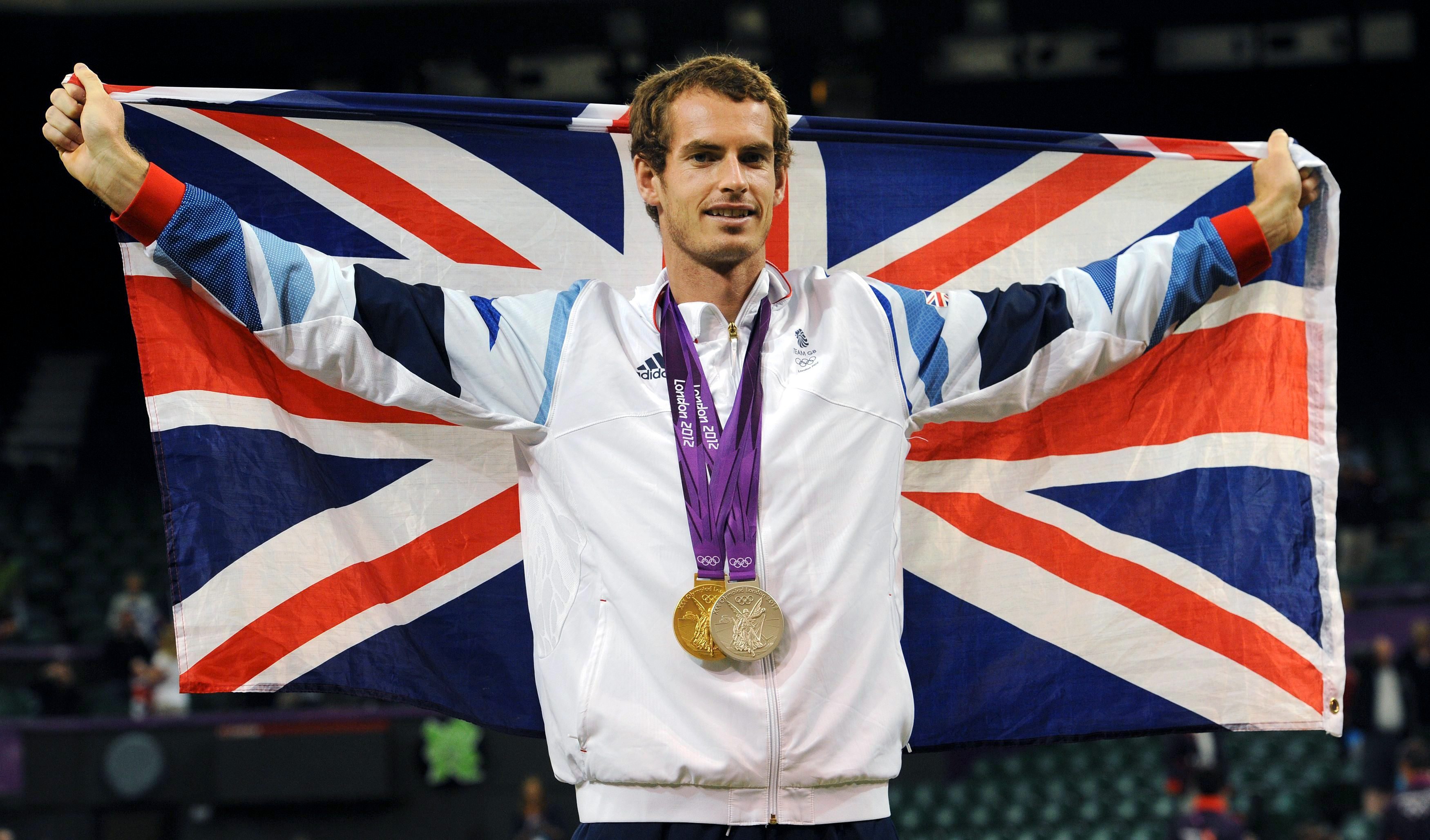 File photo dated 05/08/2012 of Great Britain's Andy Murray with his Olympic Gold and Silver Medals at Wimbledon.