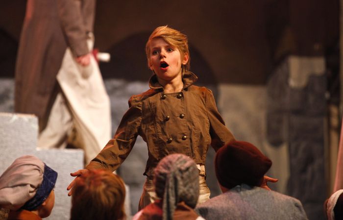Image #: 28188508 Neil Barris | Mlive.com Jamie Miller, who plays Gavroche, acts out a scene during a dress rehearsal of 'Les Miserables' at the Midland Center for the Arts, Wednesday, March. 19, 2014. The play opens on Friday, March. 21, 2014. MLIVE.COM /Landov