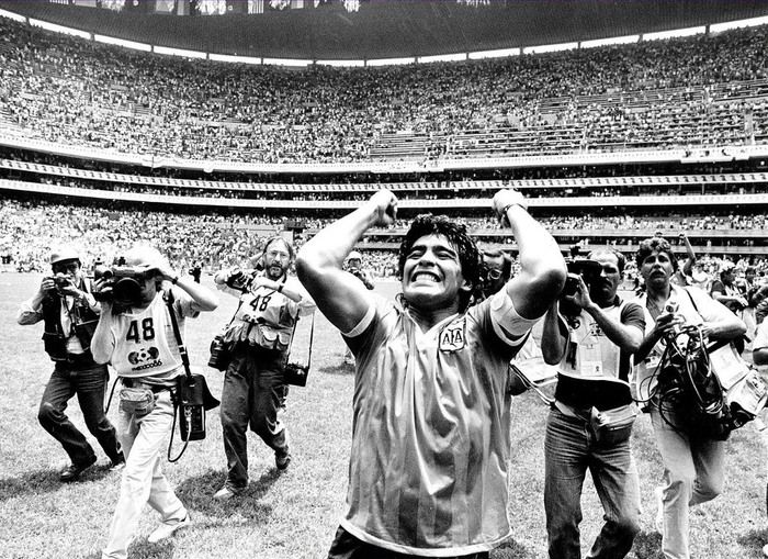 Football - 1986 World Cup - Quarter Final - Argentina v England - Mexico City - 22/6/86 Diego Maradona celebrates Argentina's victory after his two goals, the first of which was the infamous "Hand of God" goal & the second one of the greatest goals of all time Mandatory Credit: Action Images / MSI PLEASE NOTE: FOR UK EDITORIAL SALES ONLY. CONTRACT CLIENTS: ADDITIONAL FEES MAY APPLY - PLEASE CONTACT YOUR ACCOUNT MANAGER