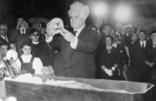 08 Jun 1954, Vienna, Austria --- Original caption: Skull of Composer Re-Buried with Other Relics. Vienna, Austria: In an unusual but solemn ceremony in Vienna, the skull of Joseph Haydn, famous Austrain composer, was taken from the Academy of Music to a small town (Eisenstadt) forty miles away, to be buried there in the church with other Haydn relics, 145 years after the death of the composer. Top photo, Austrian president Theodore Koerner (center) at the farewell ceremony in the Academy of Music. Bottom photo, Austrian poet and sculptor Gustinus Ambrosi placing Haydn's skull with other relics in the Eisenstadt church. --- Image by © Bettmann/CORBIS