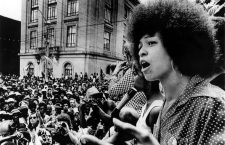 7/4/74--RALEIGH, N.C.: Black activist Angela Davis addresses a rally estimated at 5,000 people who marched through downtown Raleigh to the Capitol Building sponsored by the National Alliance Against Racist and Political Repression in protest of the North Carolina death penality 7/4.