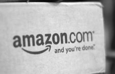 A box from Amazon.com is pictured on the porch of a house in Golden, Colorado in this July 23, 2008 file photo. Amazon.com gave a confident revenue forecast that suggested its aggressive expansion into new businesses is paying off, soothing concerns about its slimmed-down profit margin, according to news reports on April 26, 2011.  REUTERS/Rick Wilking/Files (UNITED STATES - Tags: BUSINESS)