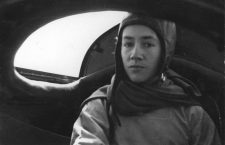 Anne Morrow Lindbergh inside the rear cockpit of the modified Lockheed Sirius during the Arctic air-route survey mission in 1933.