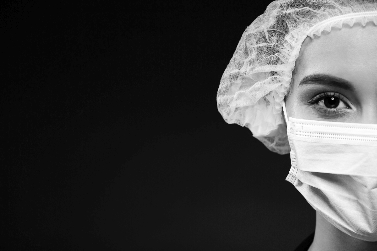 Cropped portrait of serious doctor isolated