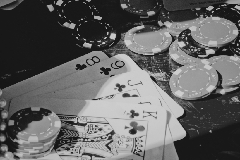 poker hand and chips