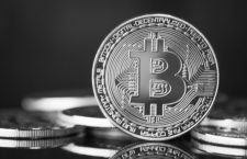 Golden Bitcoins on a blue background. New virtual money