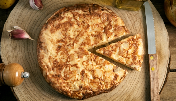 spanish omelette with potatoes and onion typical spanish cuisine tortilla espanola rustic dark background top view