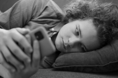medium shot suffering teenager being cyberbullied